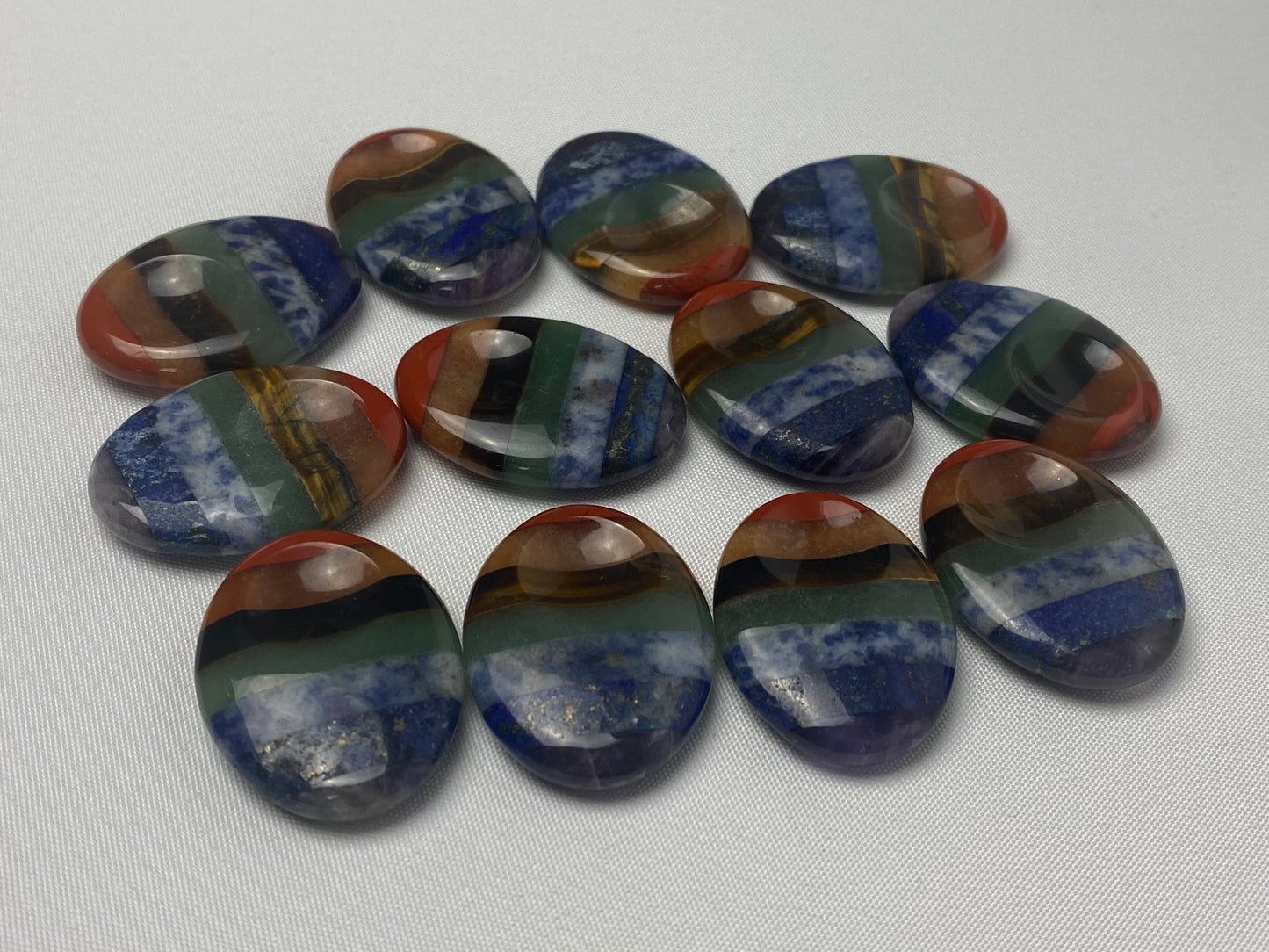 Chakra thumb stones