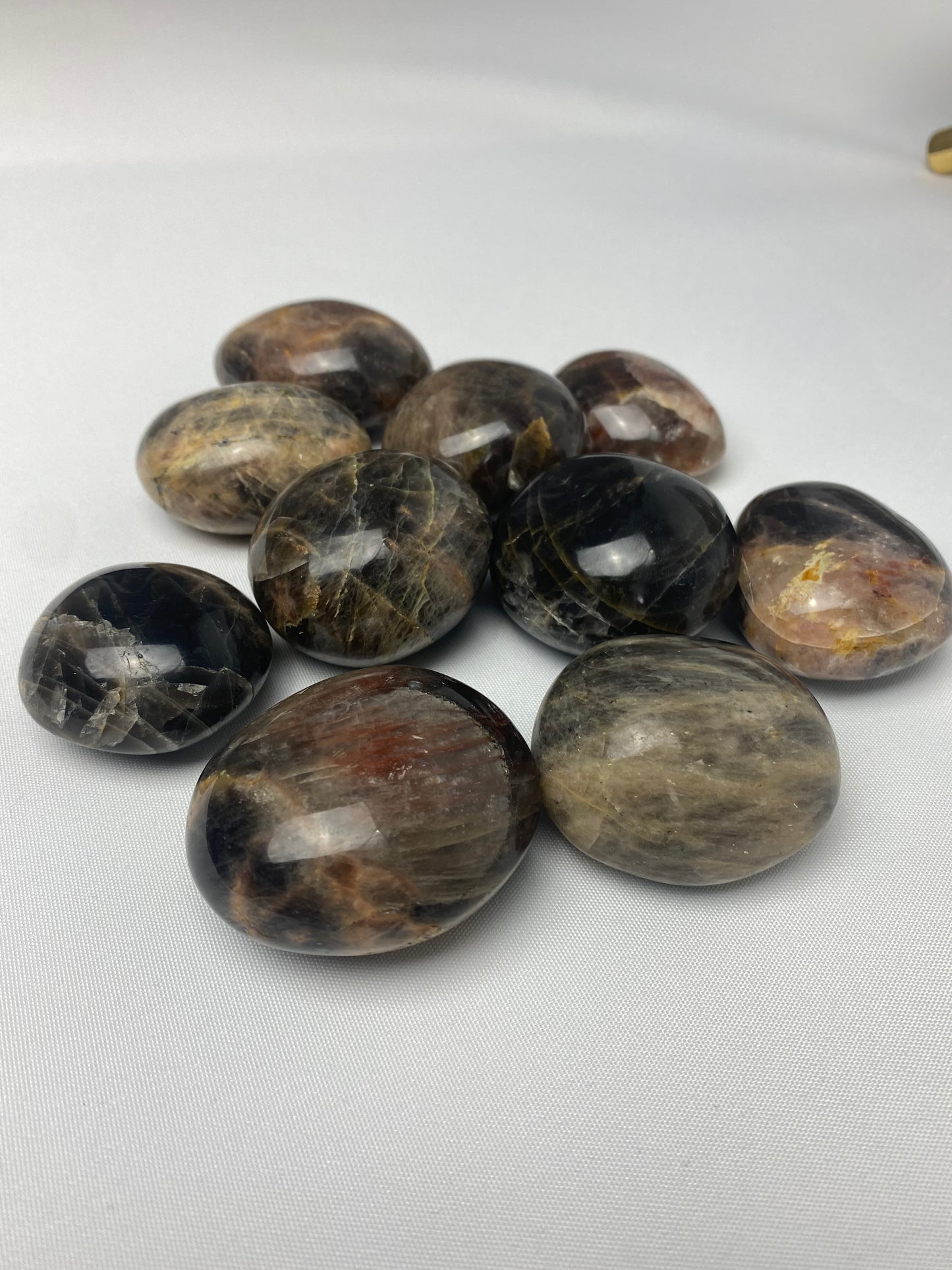 Black moonstone palm stones