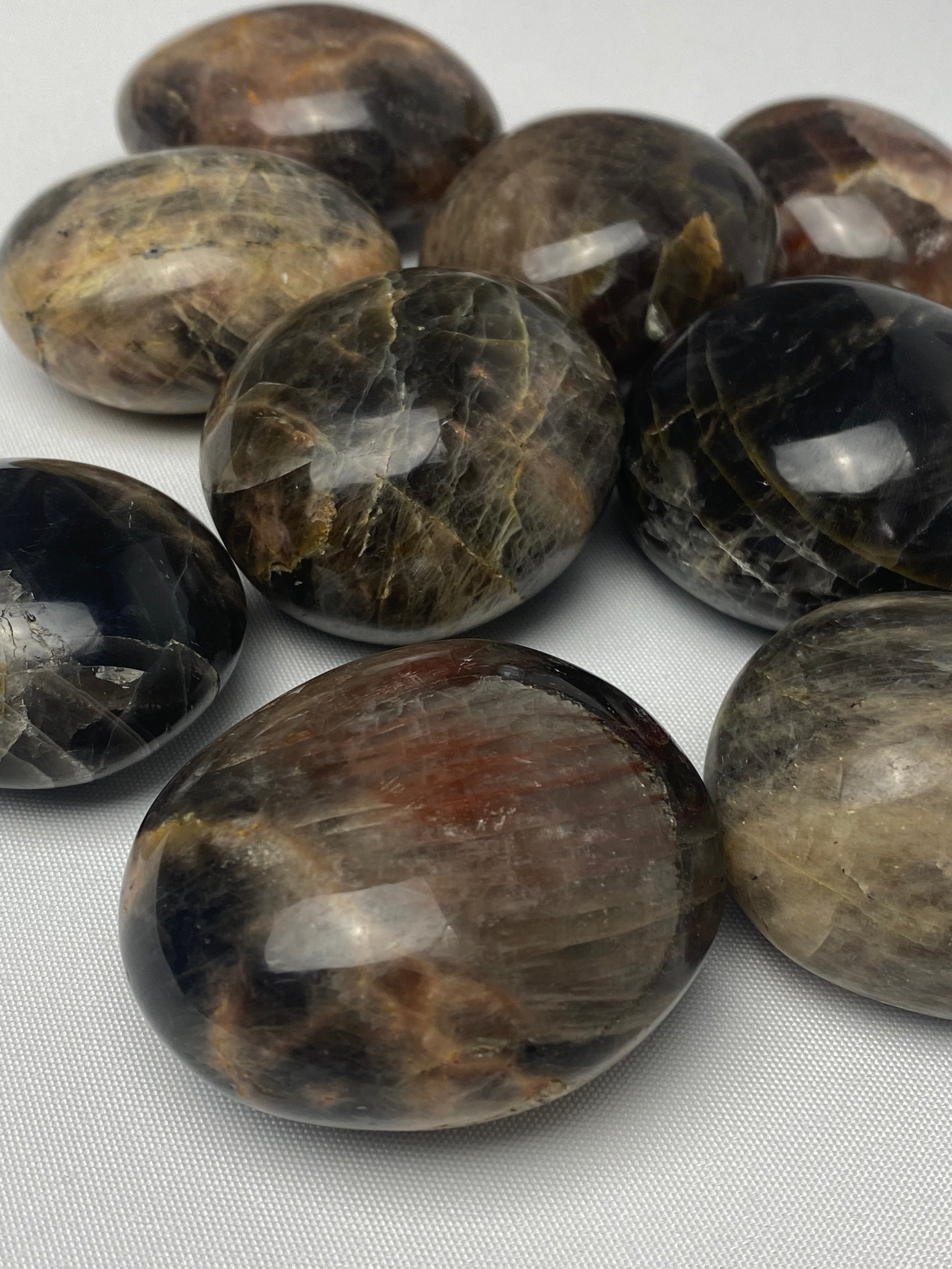 Black moonstone palm stones