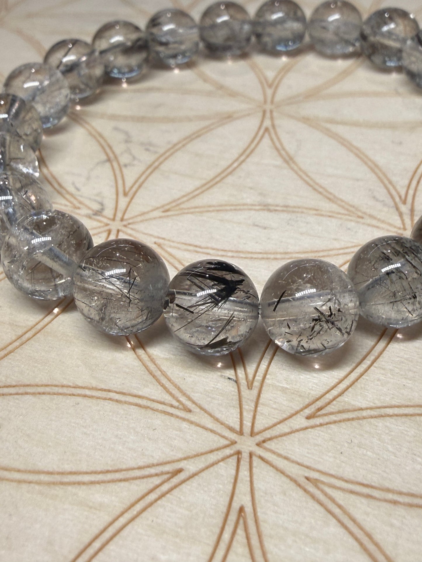Black tourmaline in quartz bracelet