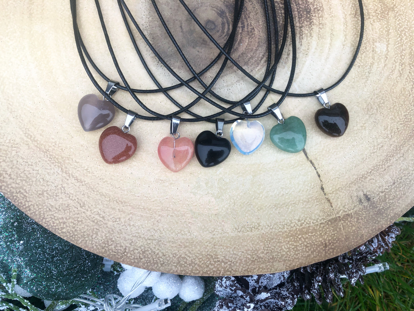 Heart pendants on black rope