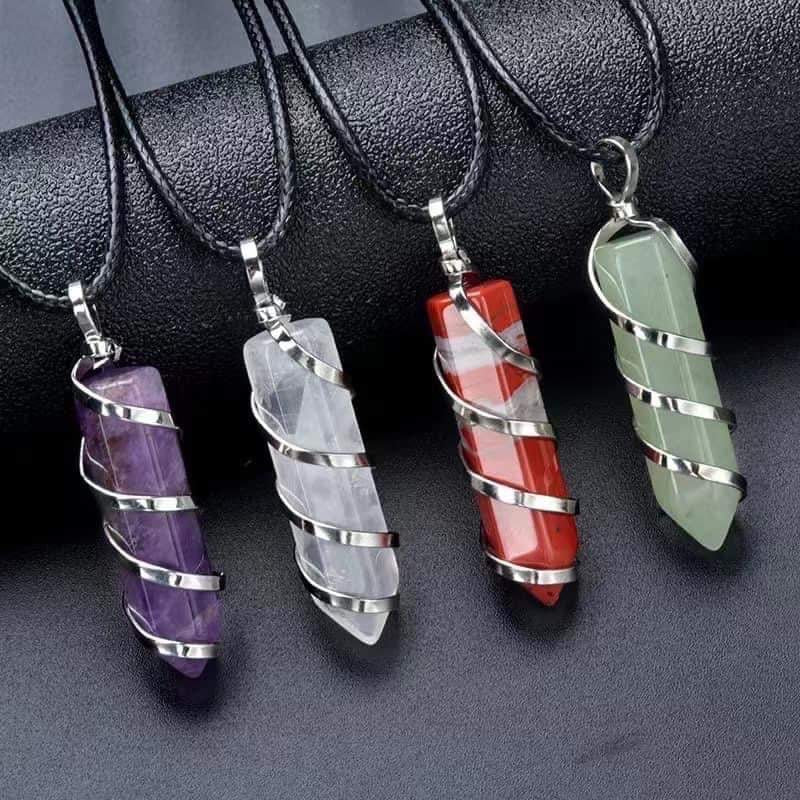 Crystal point pendants with rope
