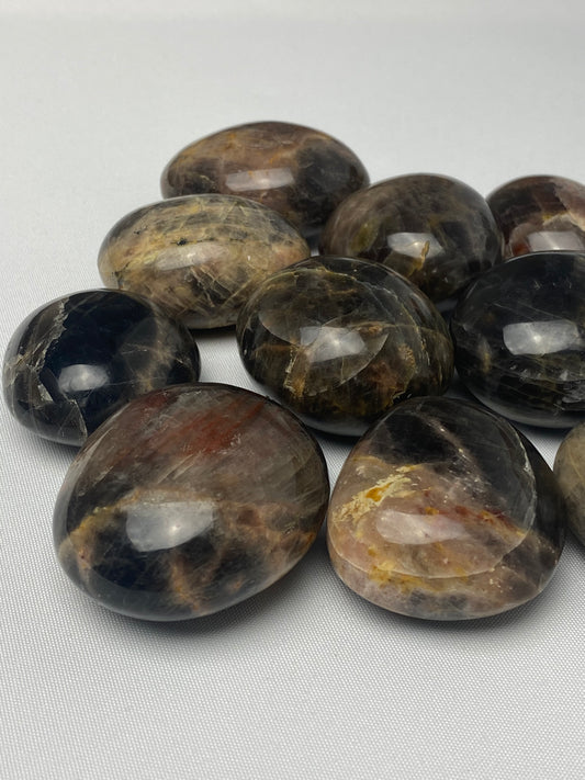 Black moonstone palm stones