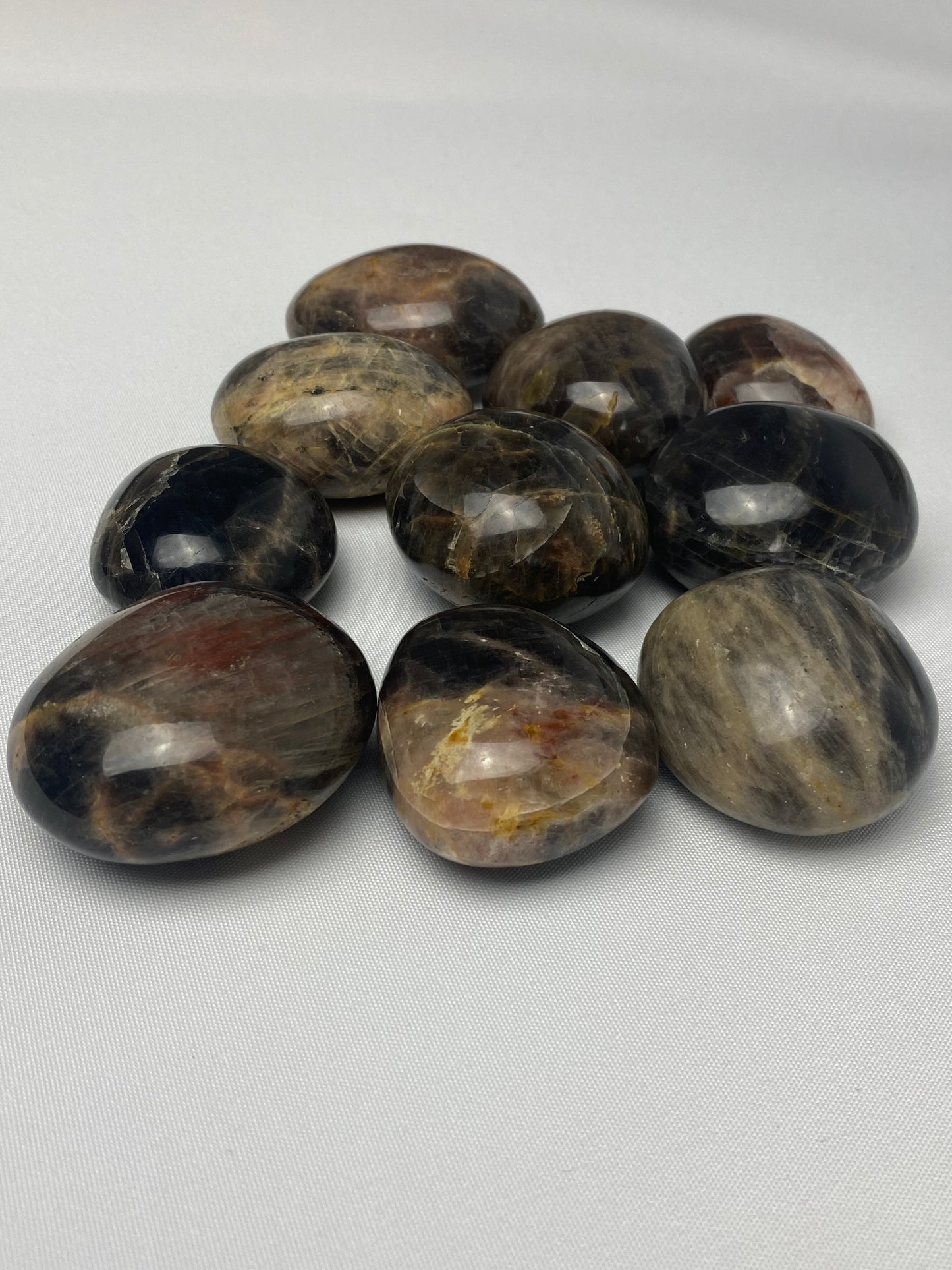Black moonstone palm stones