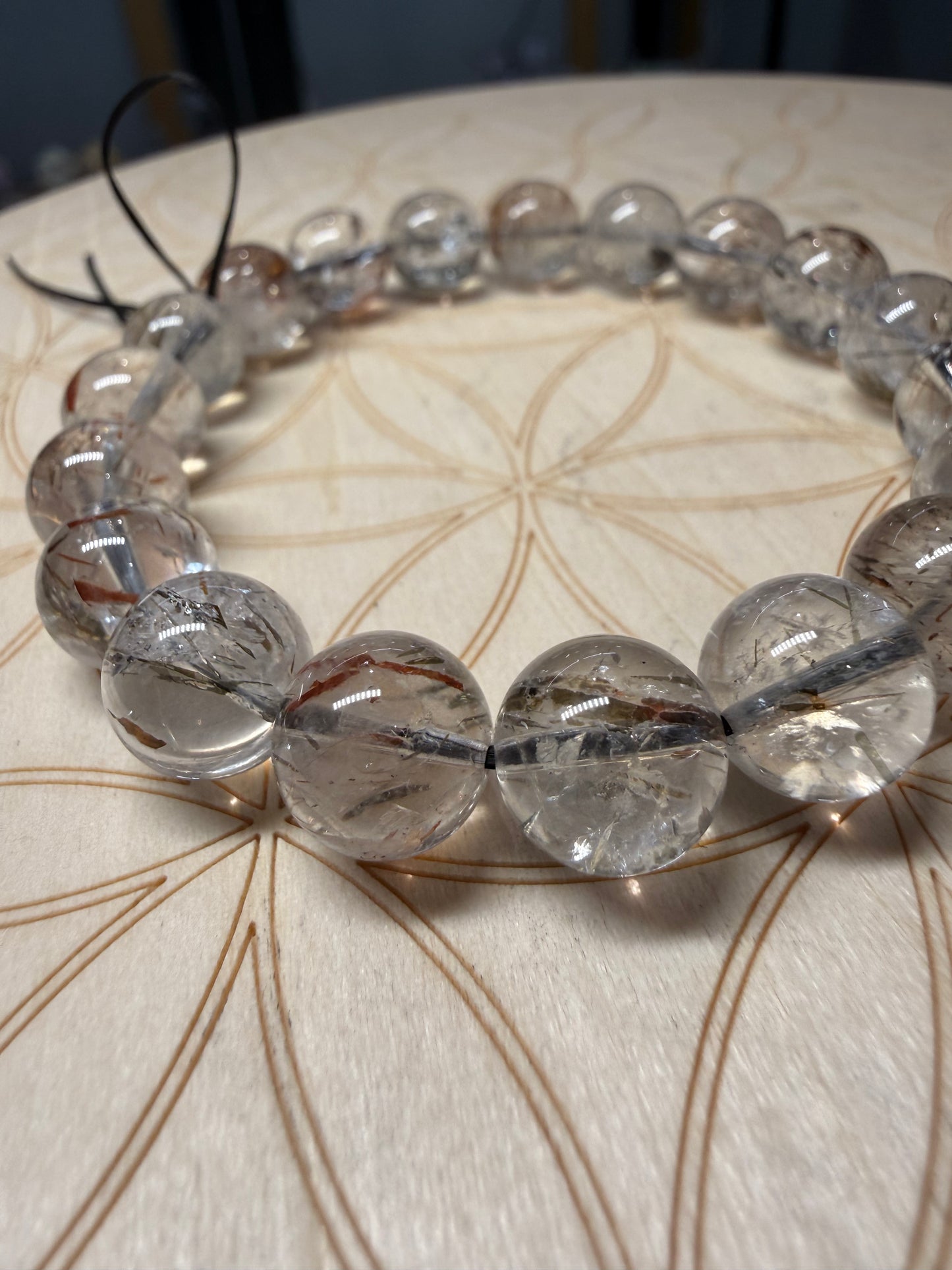 Red rutile in clear quartz