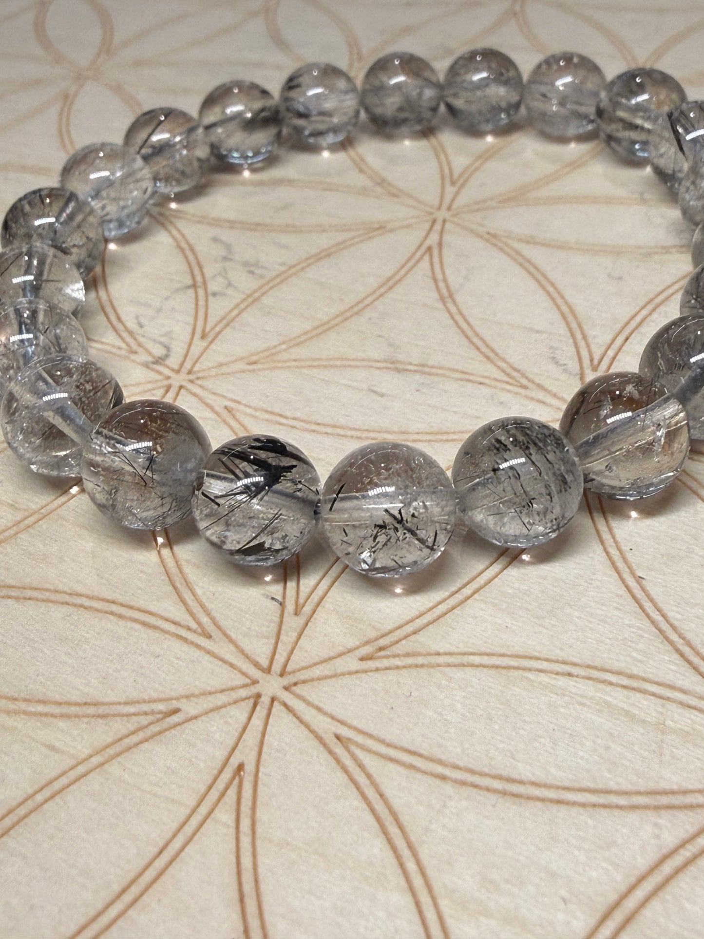Black tourmaline in quartz bracelet