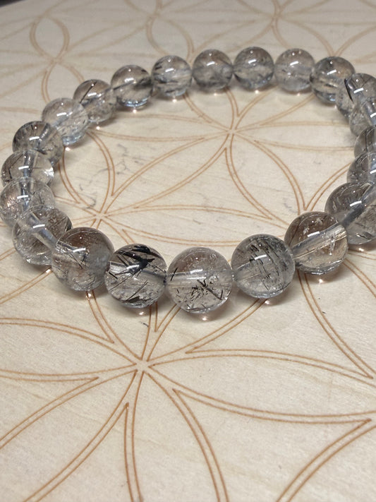 Black tourmaline in quartz bracelet