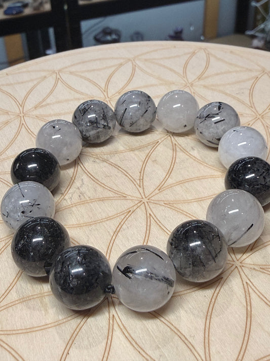 Black tourmaline in quartz bracelet